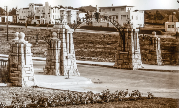 Historic photo of residence park gates.