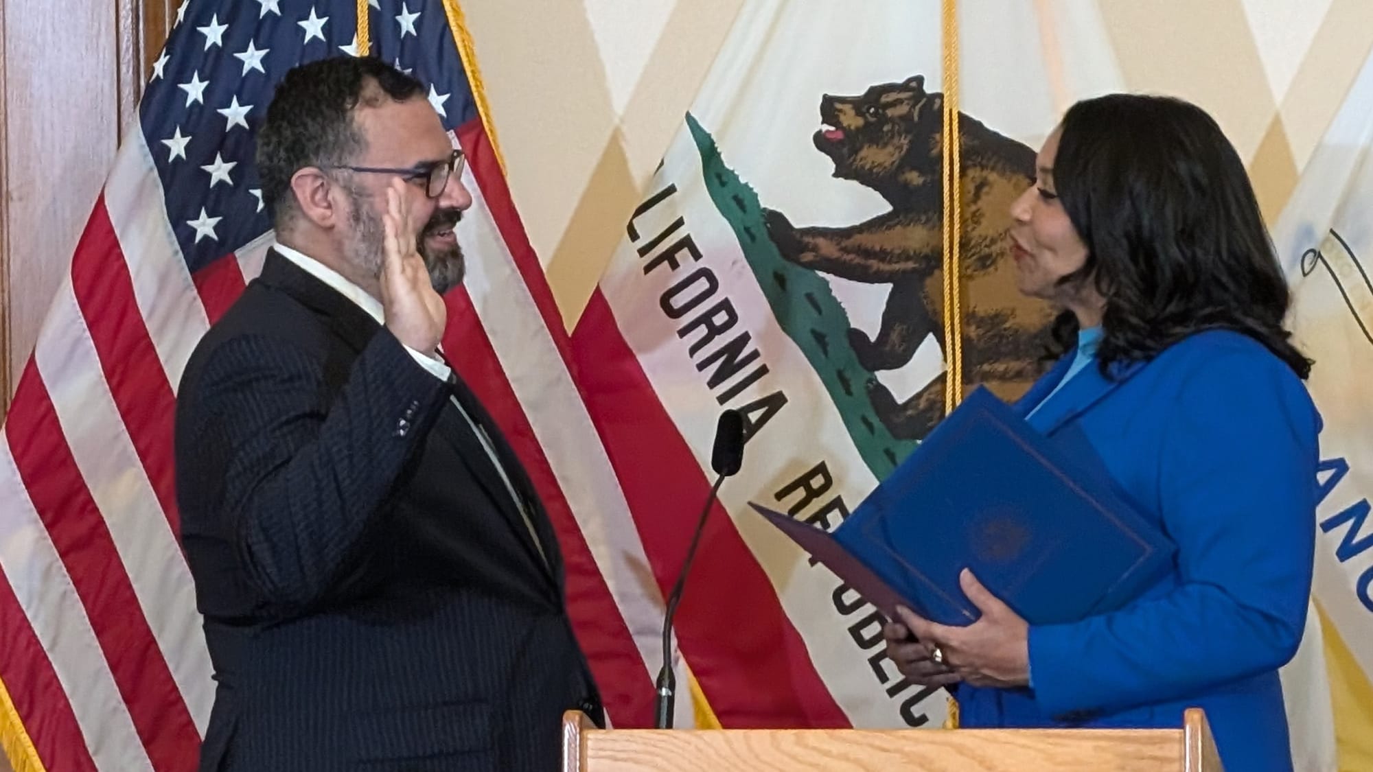 Swearing in before the flags.