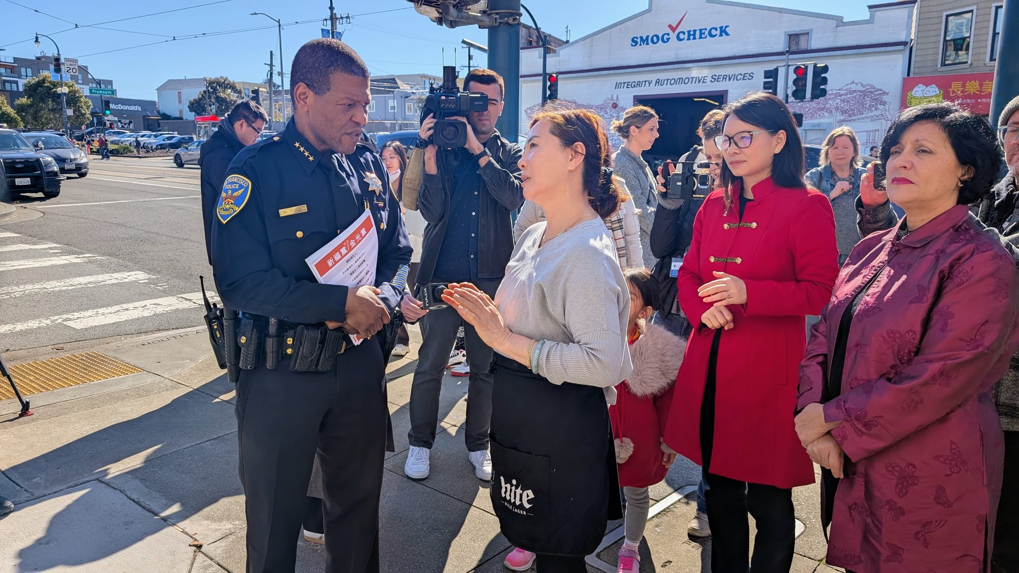 Merchant and police chief talk.