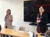 Women at meeting.